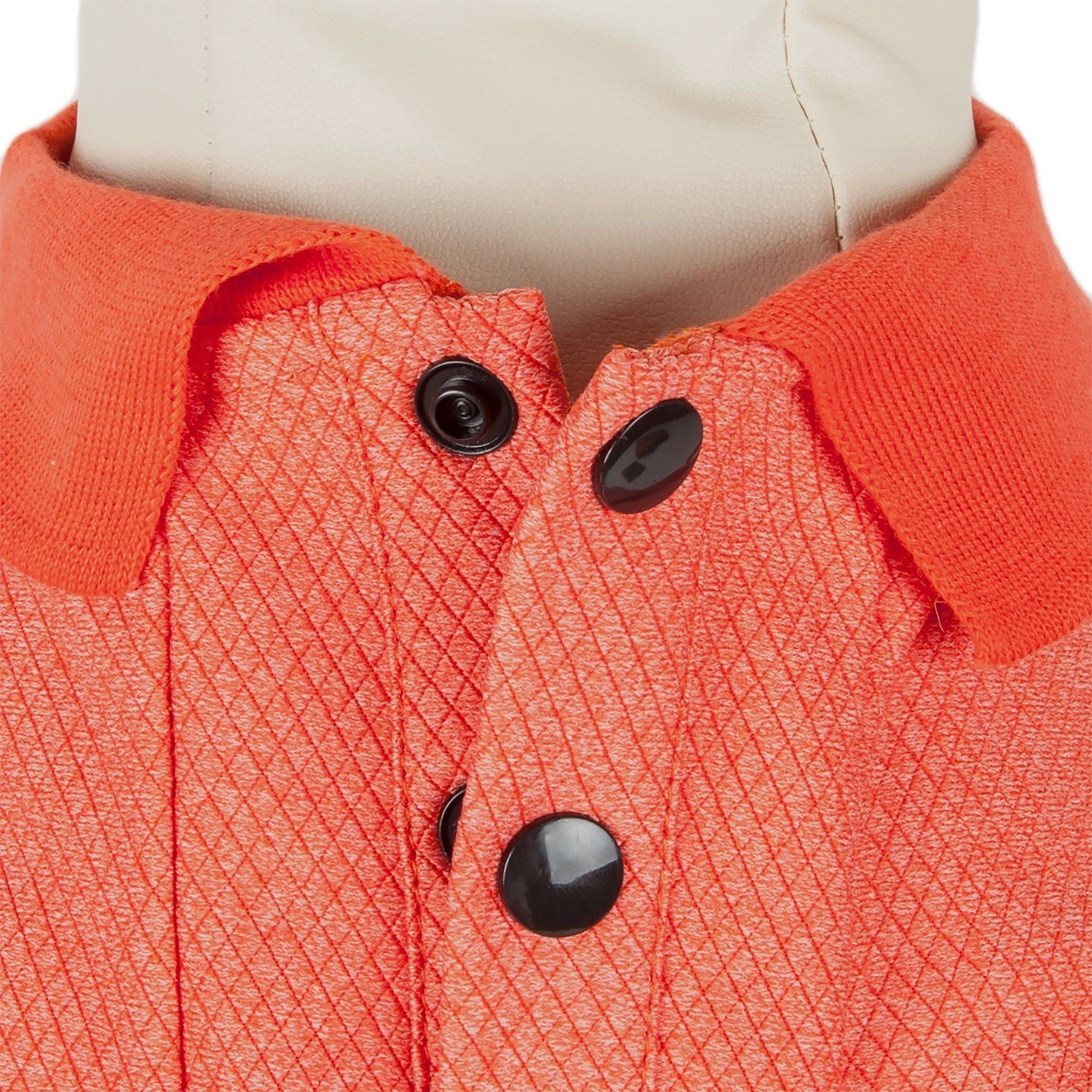 Orange dog polo shirt with diamond-textured fabric and button placket, ribbed collar