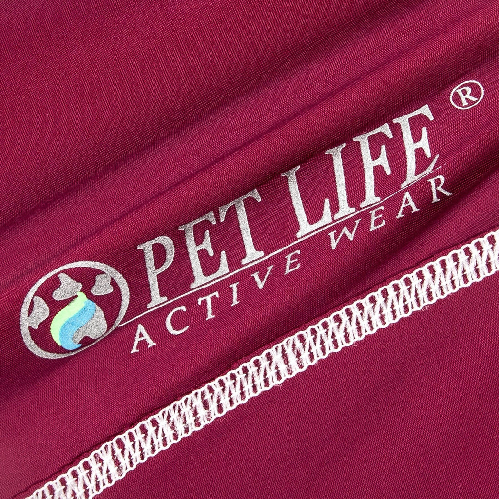 Maroon fabric close-up with printed logo and white trim stitching