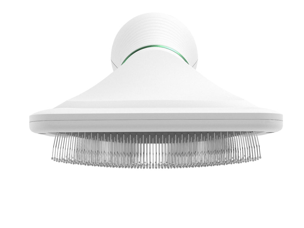 Round pin brush dryer head with dense metal prongs and green accent ring