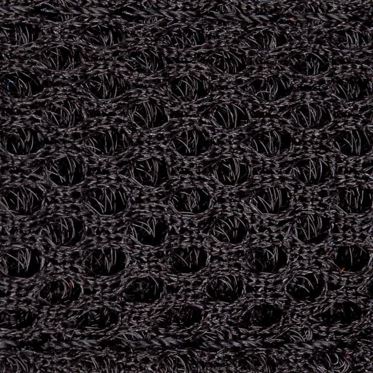 Close-up of black breathable mesh fabric with circular ventilation holes