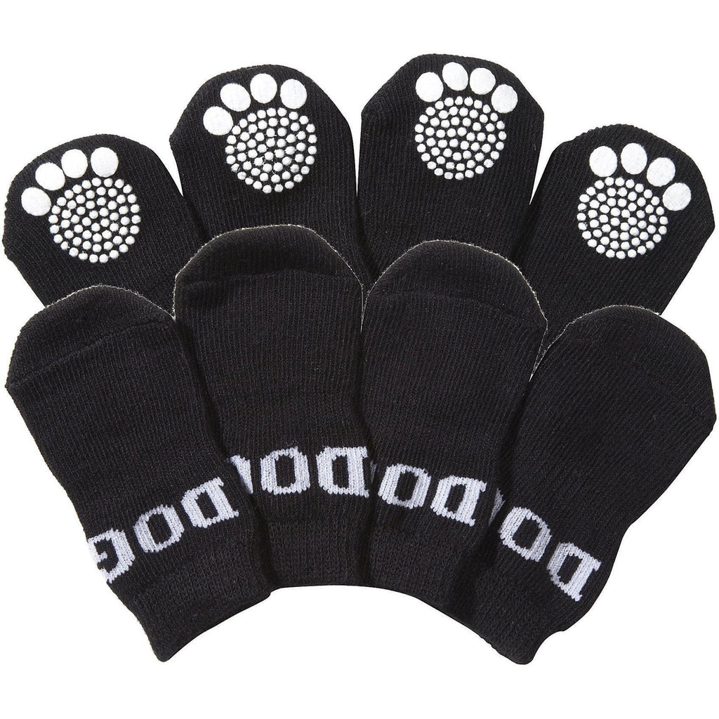 Set of 4 black dog socks with white paw-print grip soles, anti-slip tread