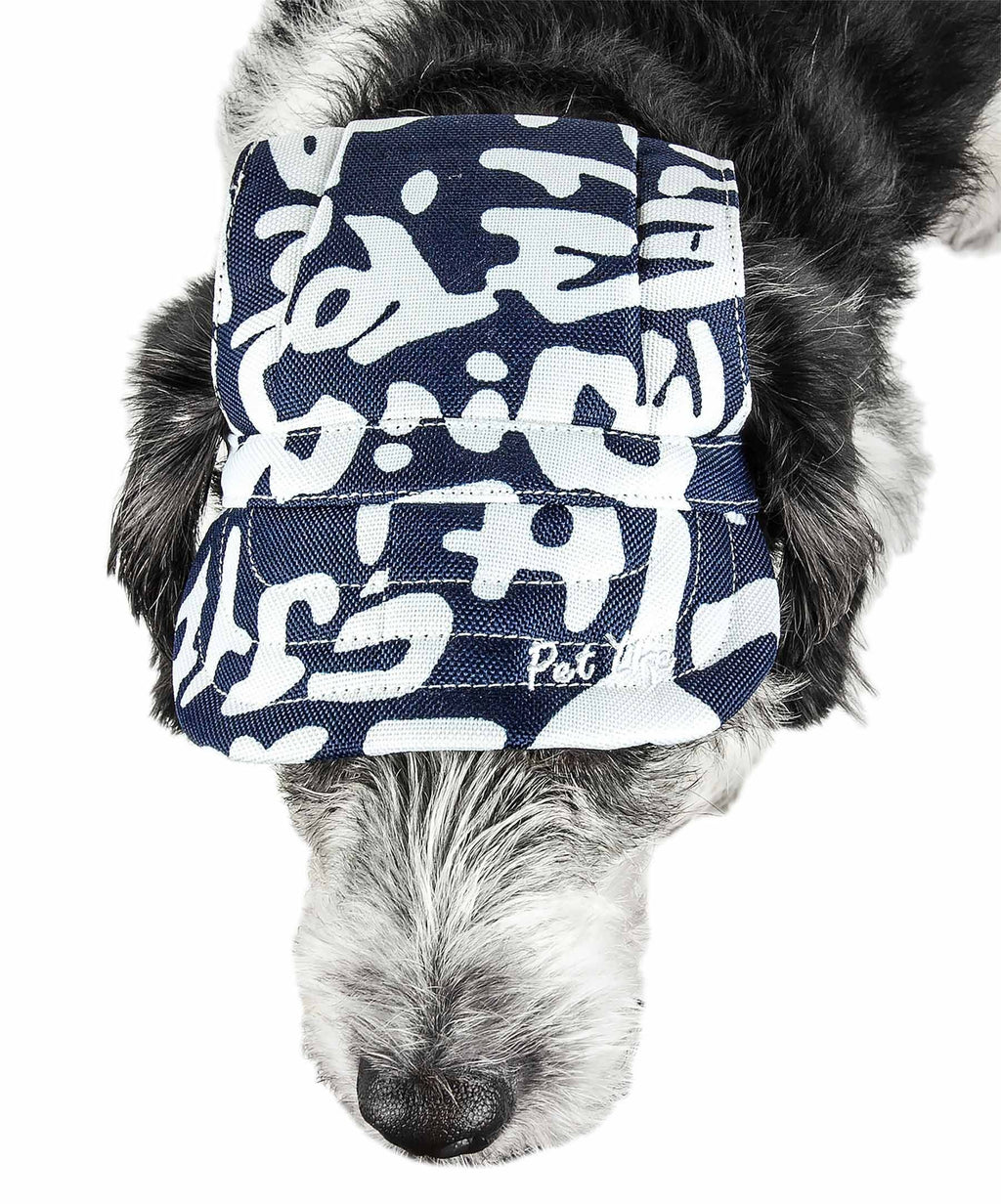 Dog hat in navy/white graffiti camo with ruched back and logo patch