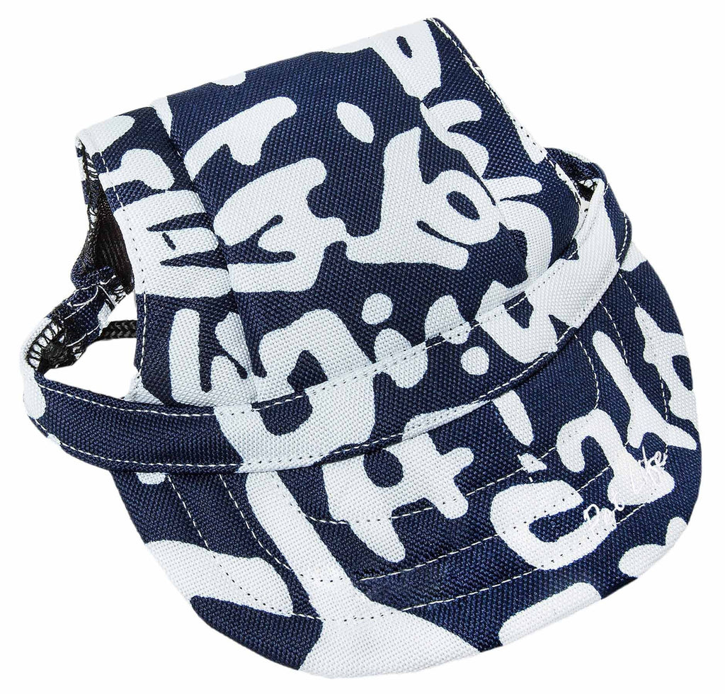 Navy-and-white graffiti camo dog hat with stitched brim and side chin strap