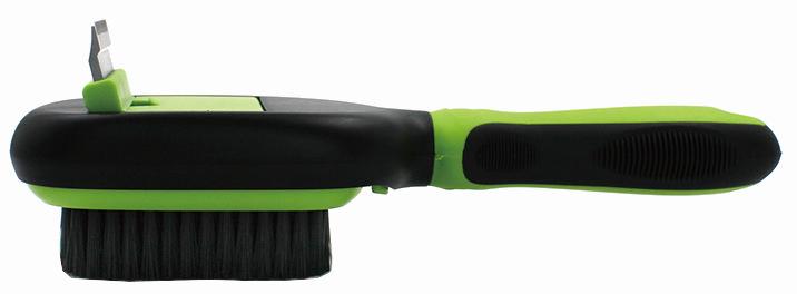 Green-and-black pet brush with wide soft bristle head and textured grip handle