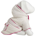 Cream insulated dog puffer jacket with pink piping and hood, side view