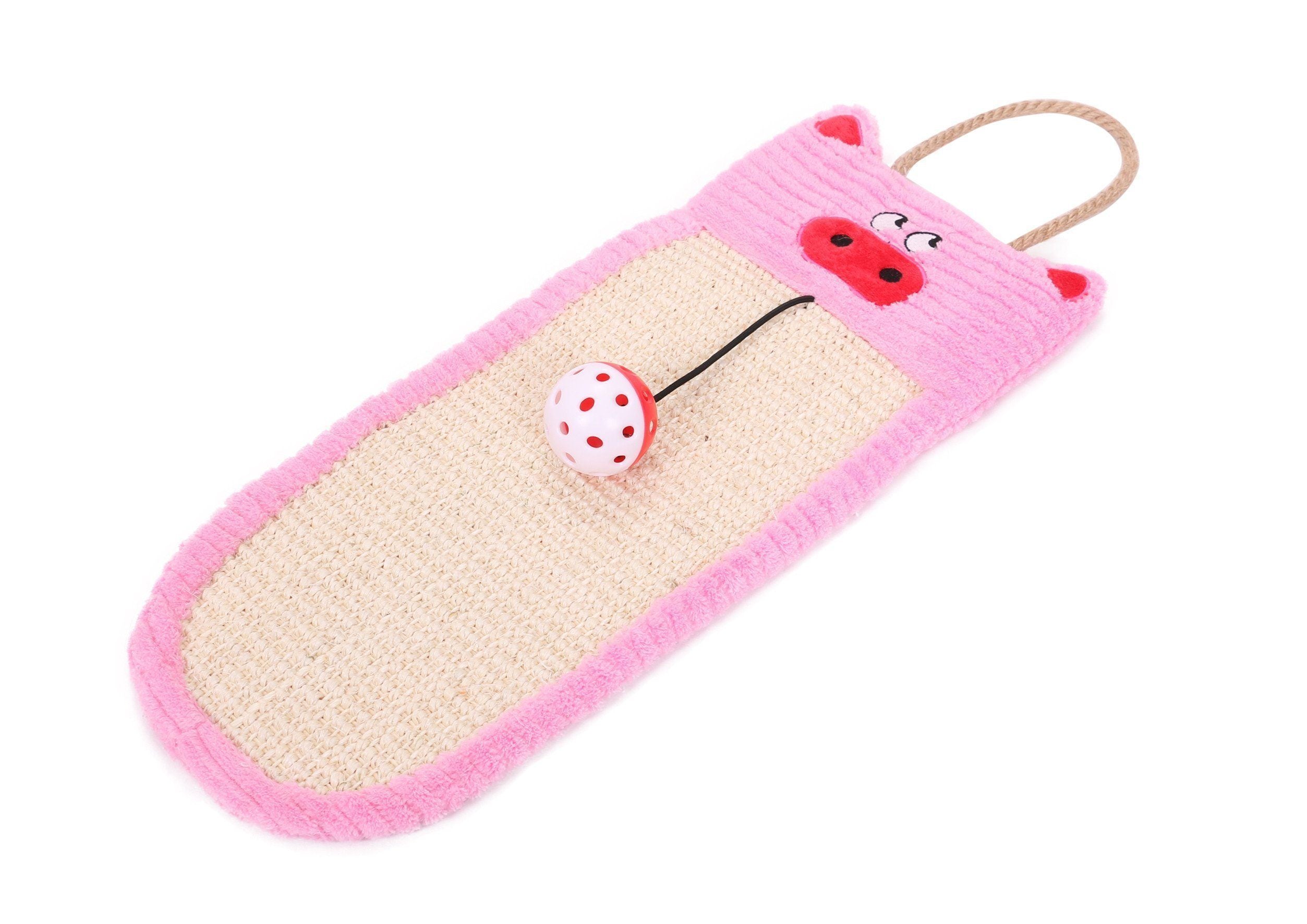 Pink sisal-jute hanging cat scratcher with ladybug patch and red/white ball toy