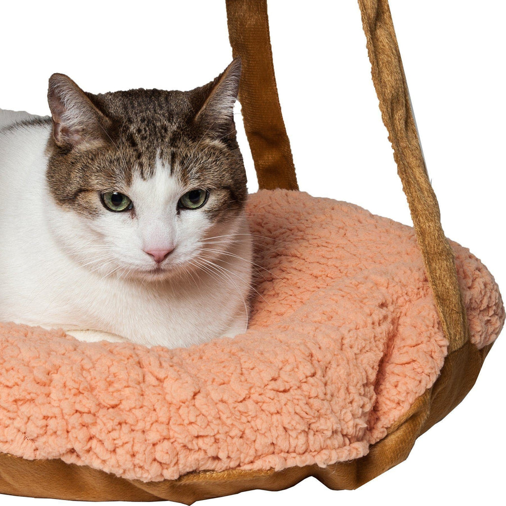 Brown hanging cat hammock lounger with textured plush oval cushion; tabby cat resting