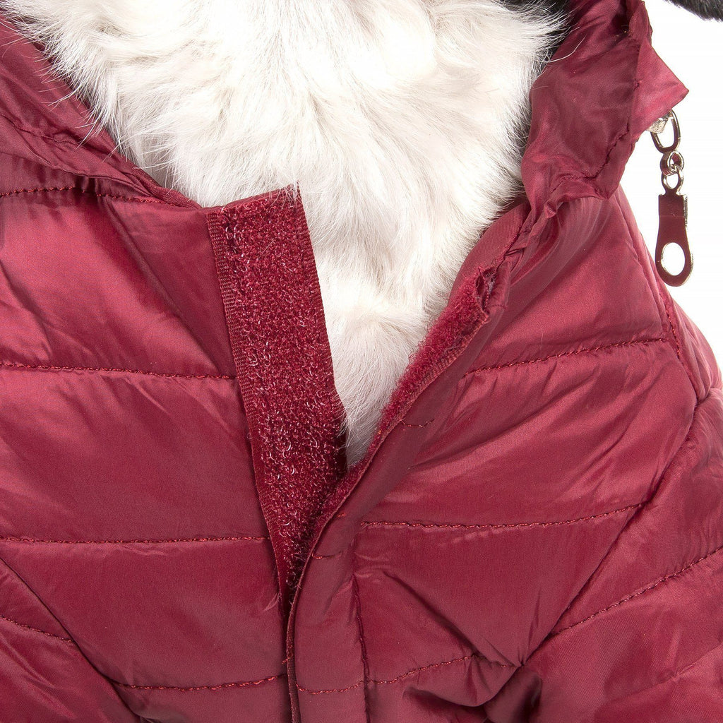Burgundy puffer dog coat close-up with textured zipper tape and stitched panels