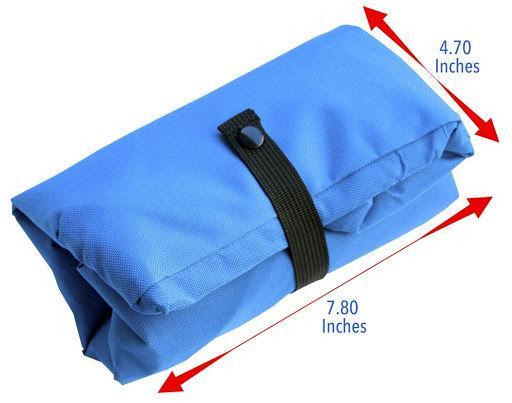 Folded blue waterproof litterbox with black strap, compact travel size
