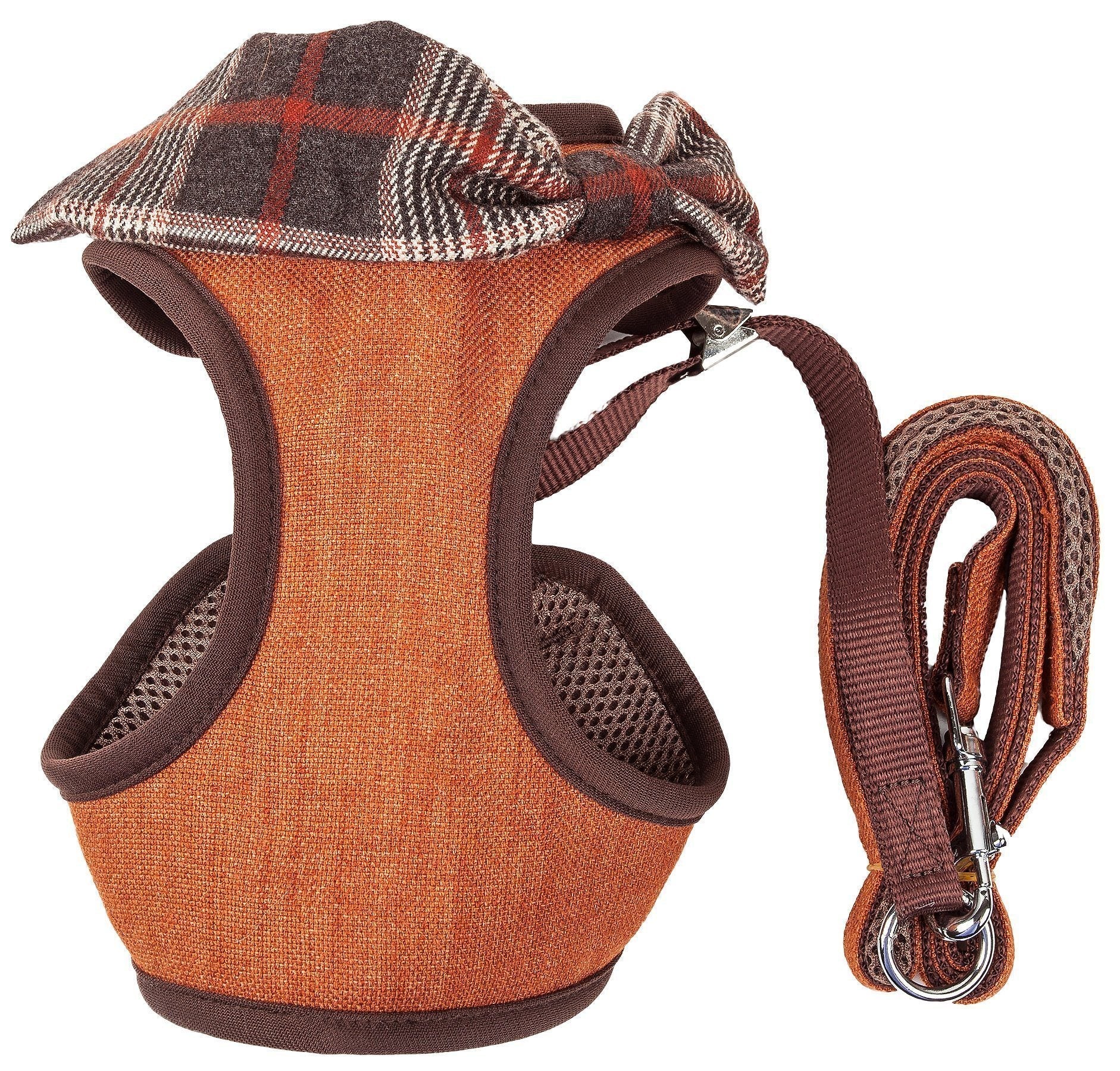 Dog harness and leash set, orange-brown carrier-style harness with plaid bow and matching leash.