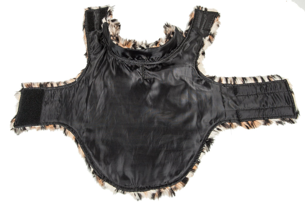 Black outer dog coat liner with faux-fur trimmed openings and side straps