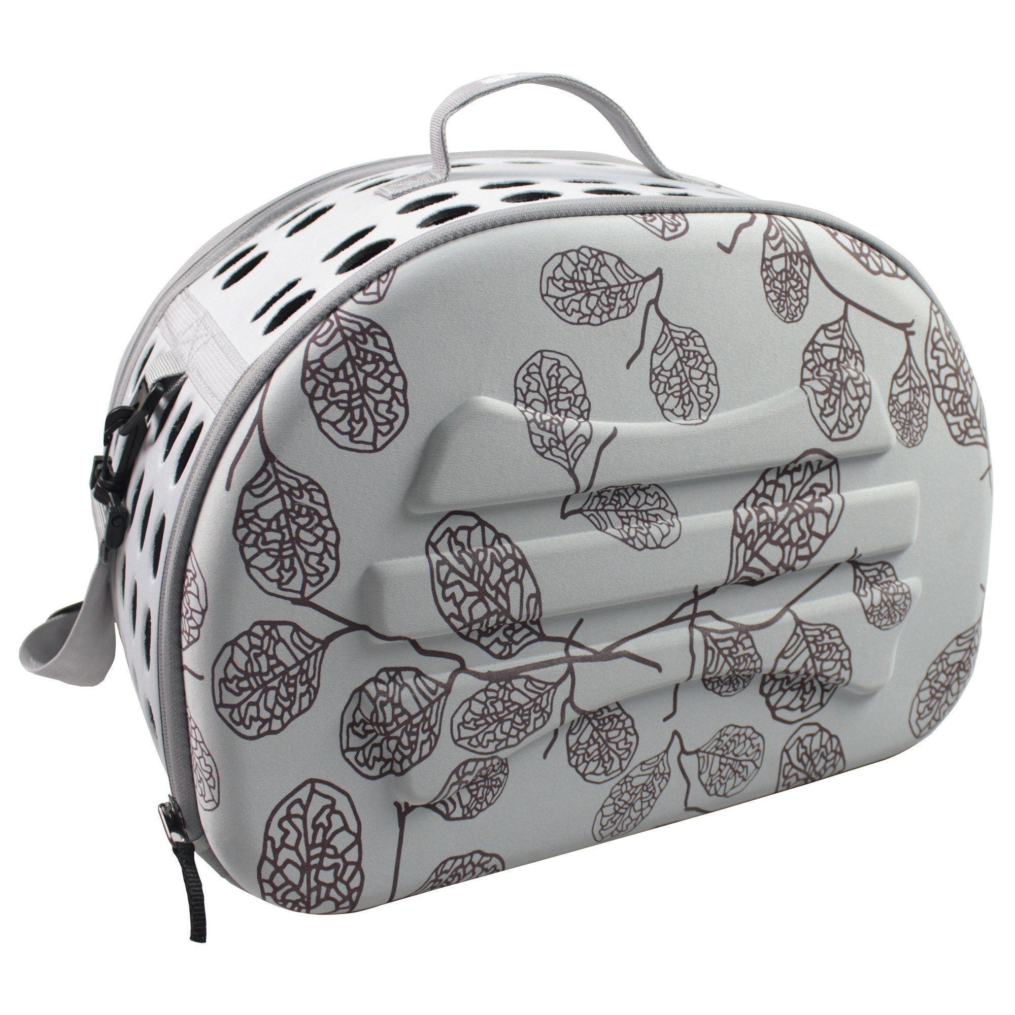Light grey pet carrier crate with dark leaf pattern shell and molded front panel