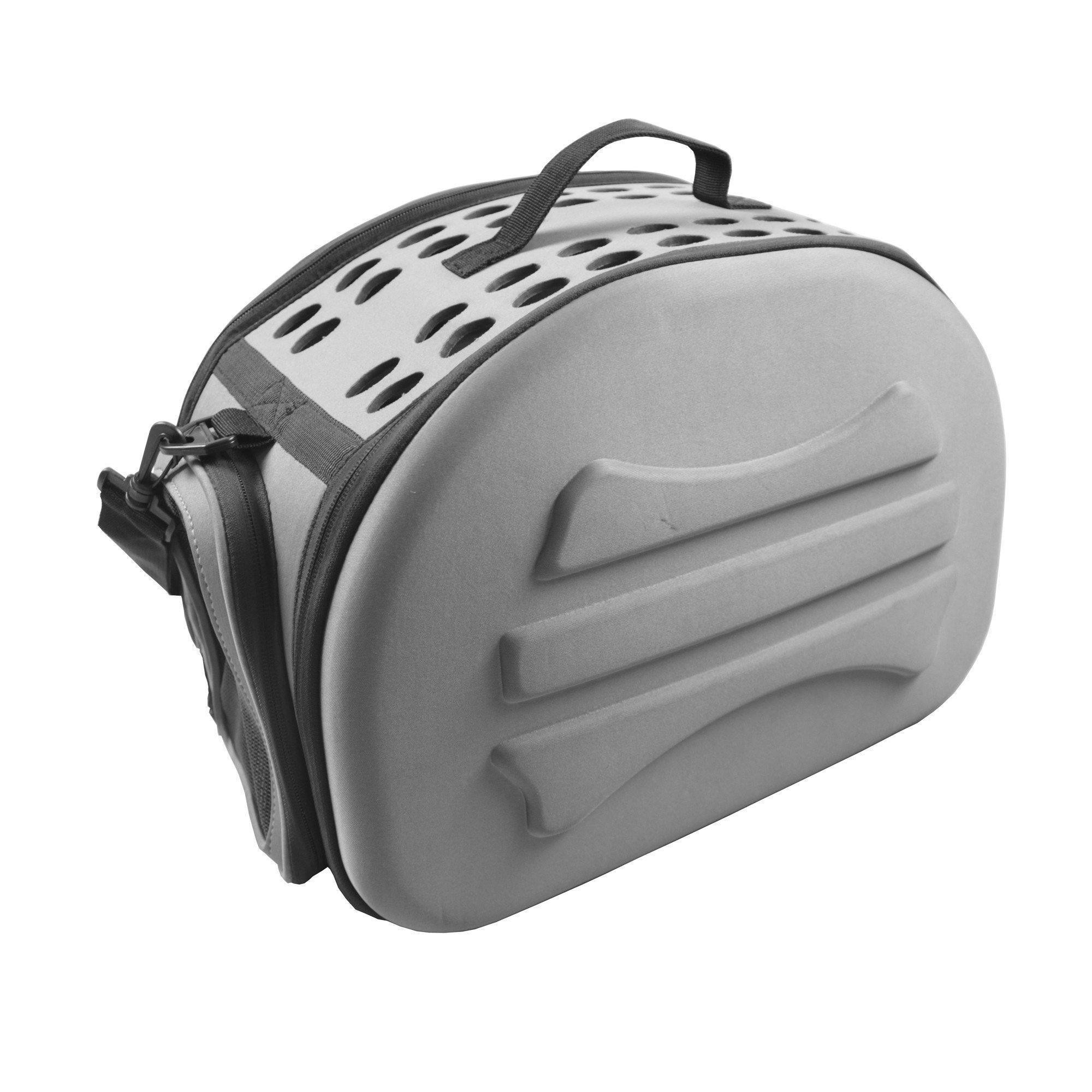 Light grey pet carrier crate side view with ventilated top panel and padded handle