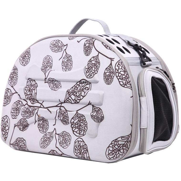 Light grey pet carrier with dark leaf pattern, mesh side window and carry handle