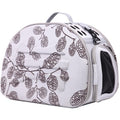 Light grey pet carrier with dark leaf pattern, mesh side window and carry handle