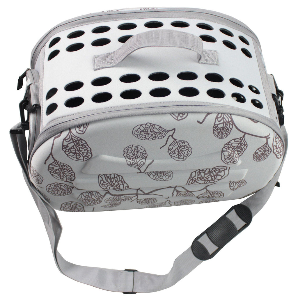 Light grey pet carrier crate with leaf pattern shell, ventilated top holes, black zipper trim