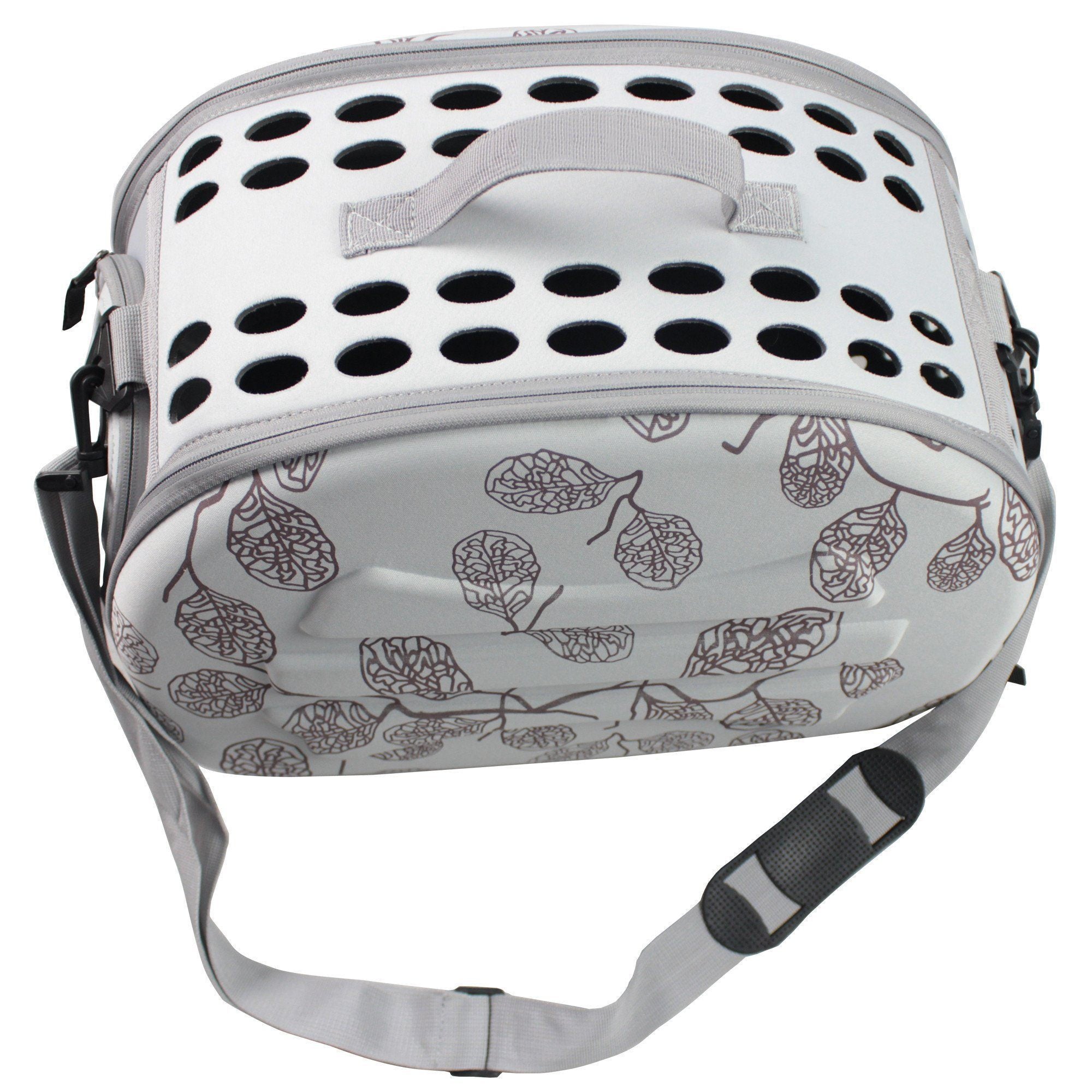 Light grey pet carrier crate with leaf pattern shell, ventilated top holes, black zipper trim