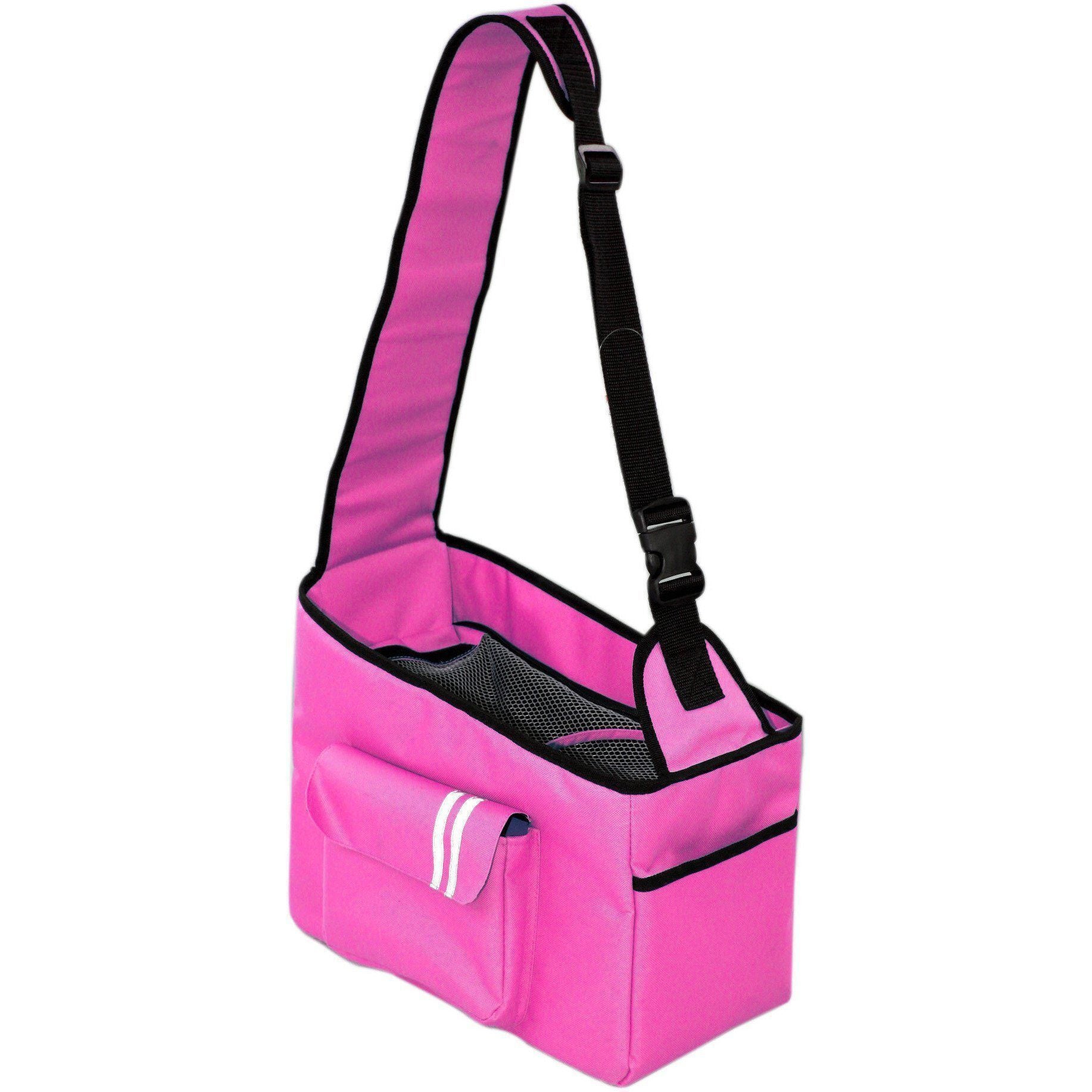 Pink over-the-shoulder dog carrier with mesh front pocket and adjustable strap