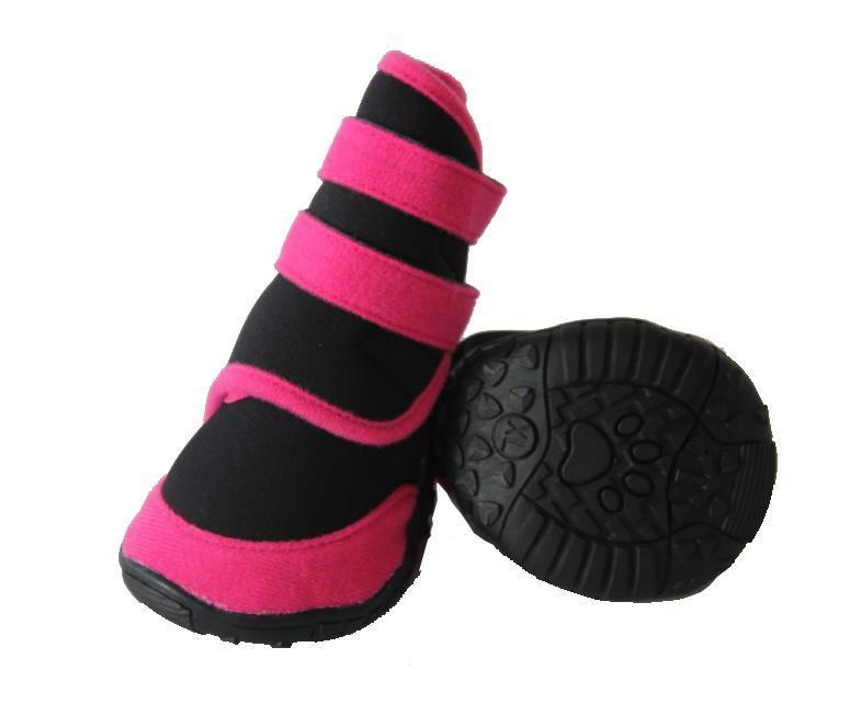 Set of 4 black dog booties with bright pink high ankle straps and rugged tread soles