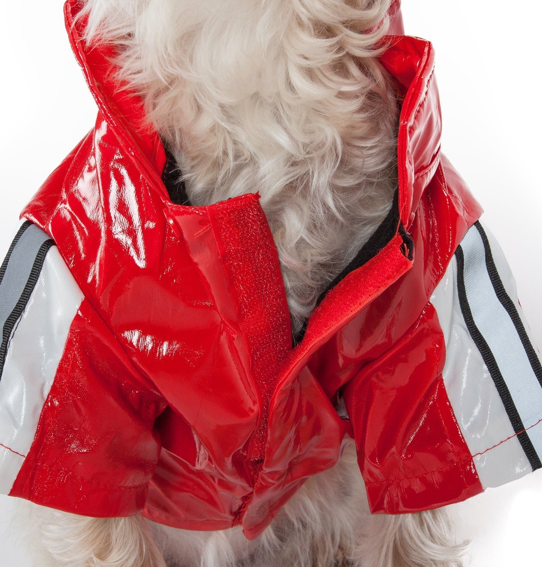 Red reflective waterproof dog raincoat close-up of hood and black stripe trim