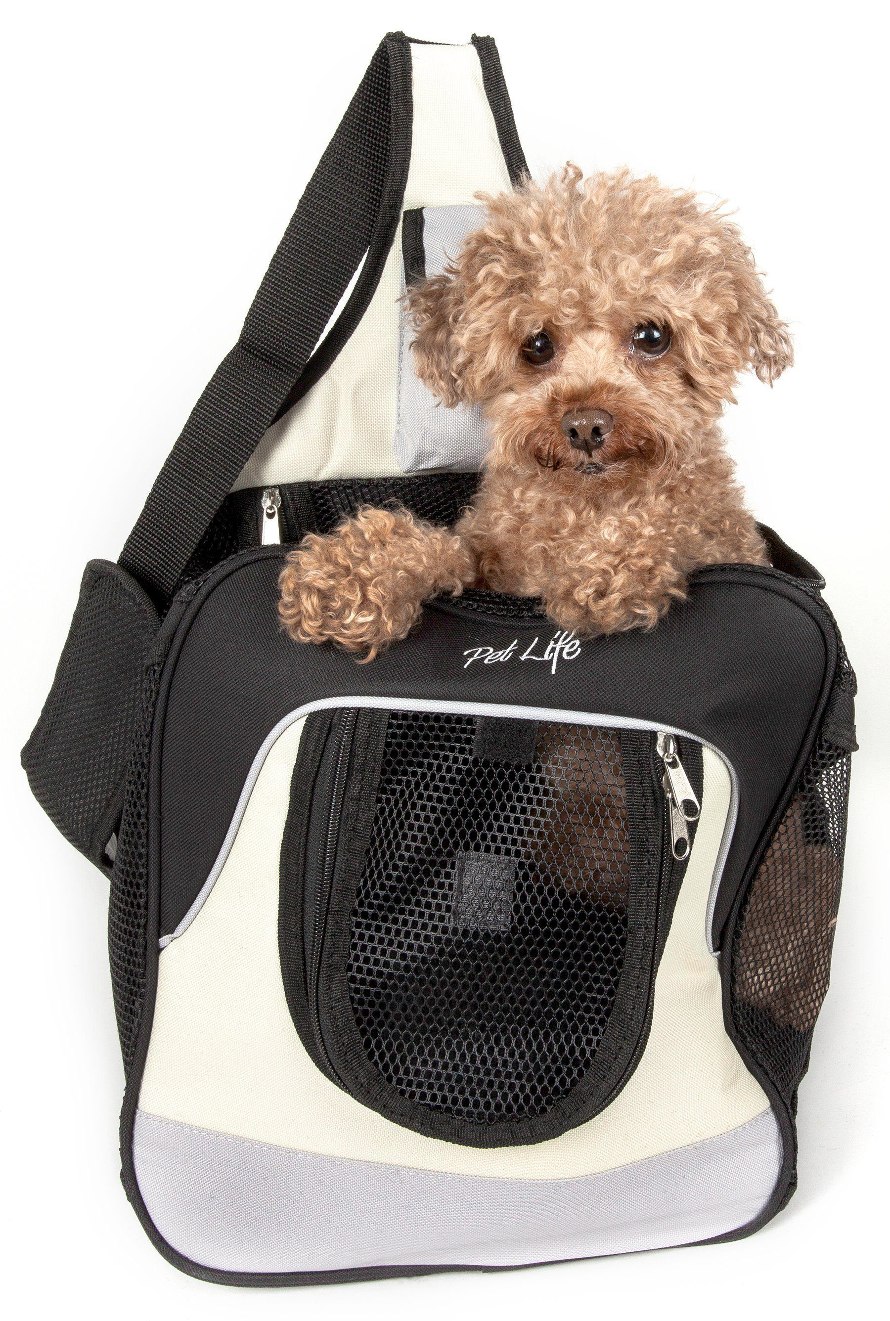 Black and white single-strap pet carrier backpack with front mesh pouch and zip front pocket