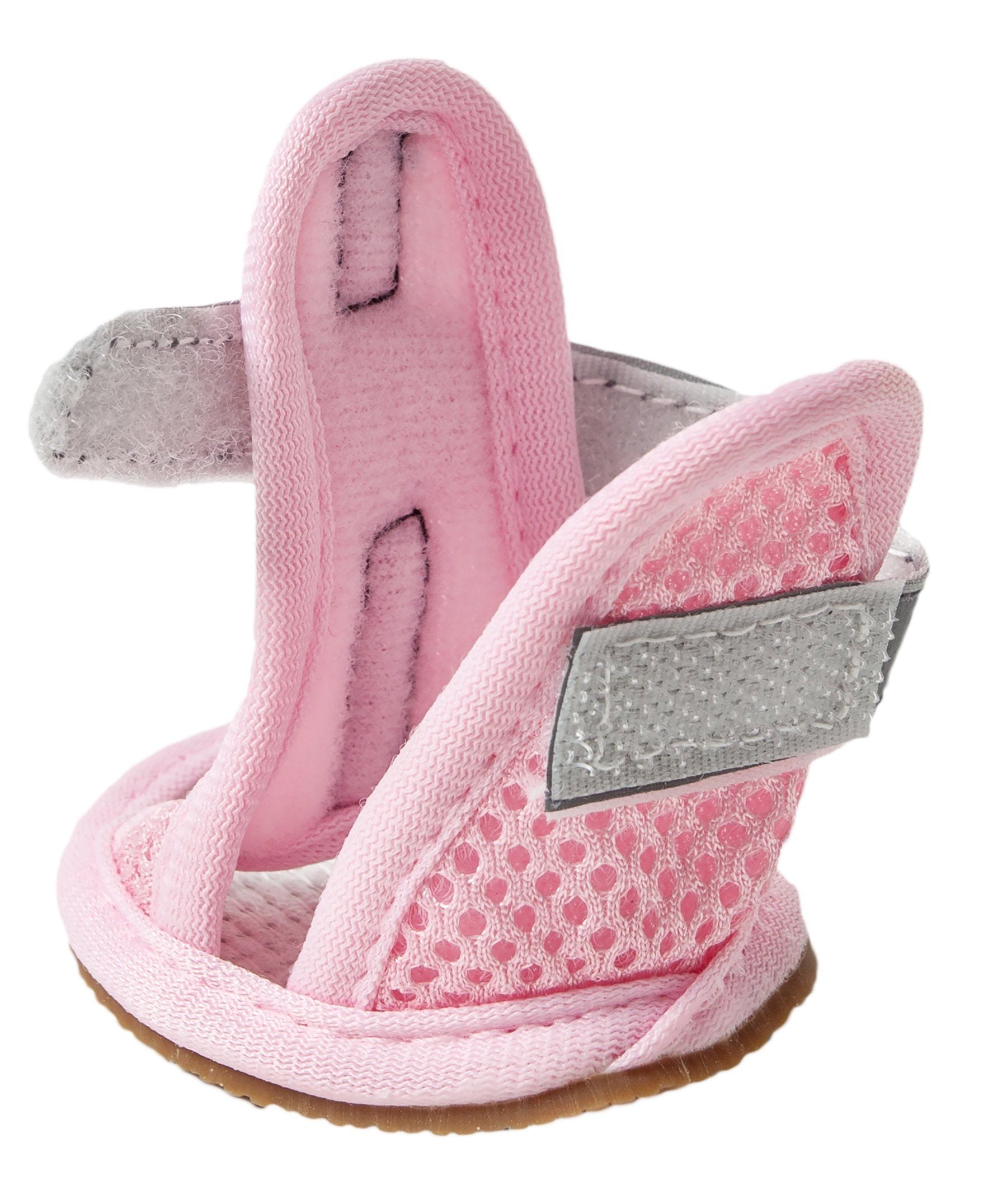Close-up pink water-resistant mesh dog sandal with gray strap and brown textured sole