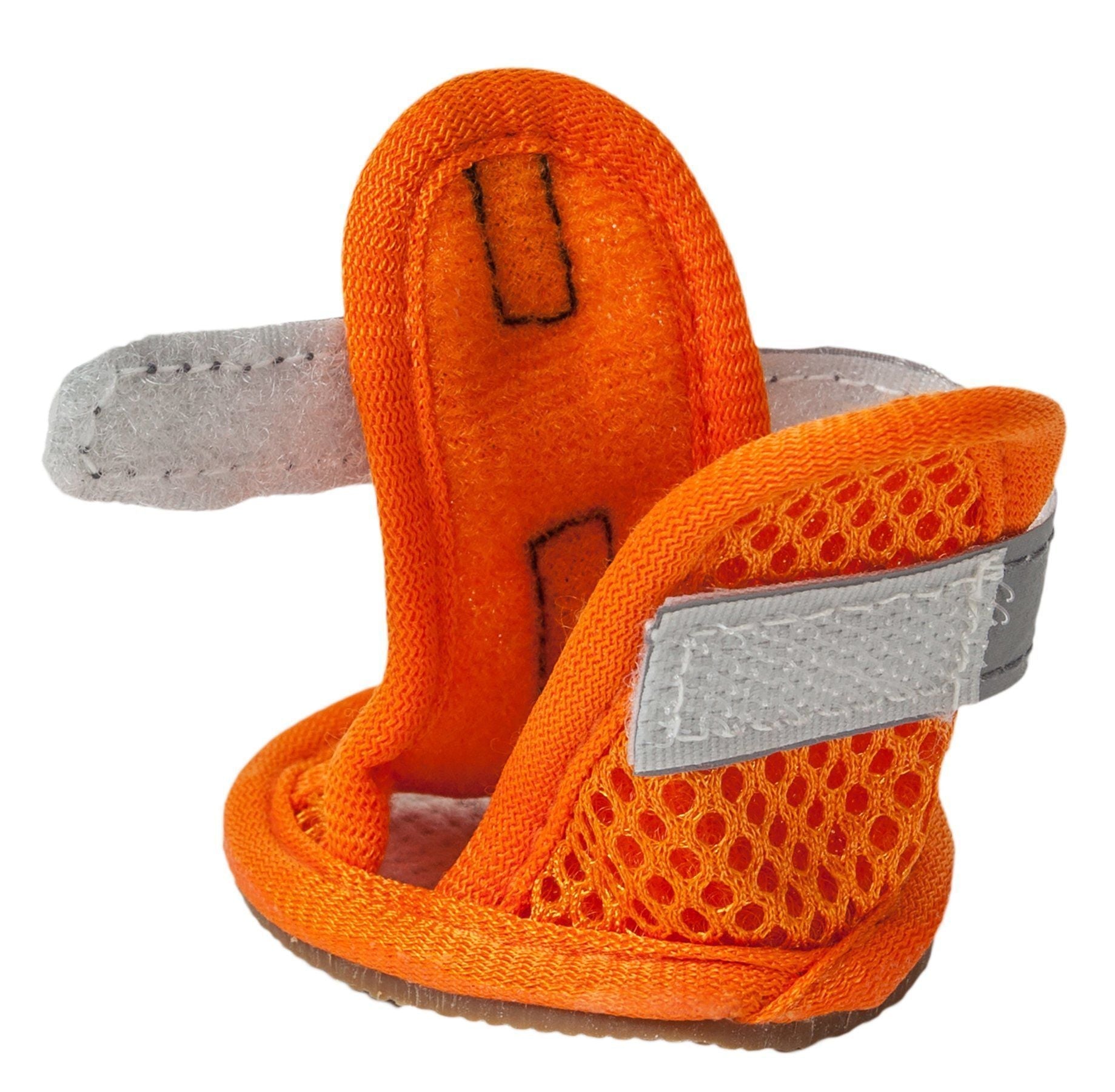 Close-up orange water-resistant mesh dog sandal with gray strap and brown textured sole