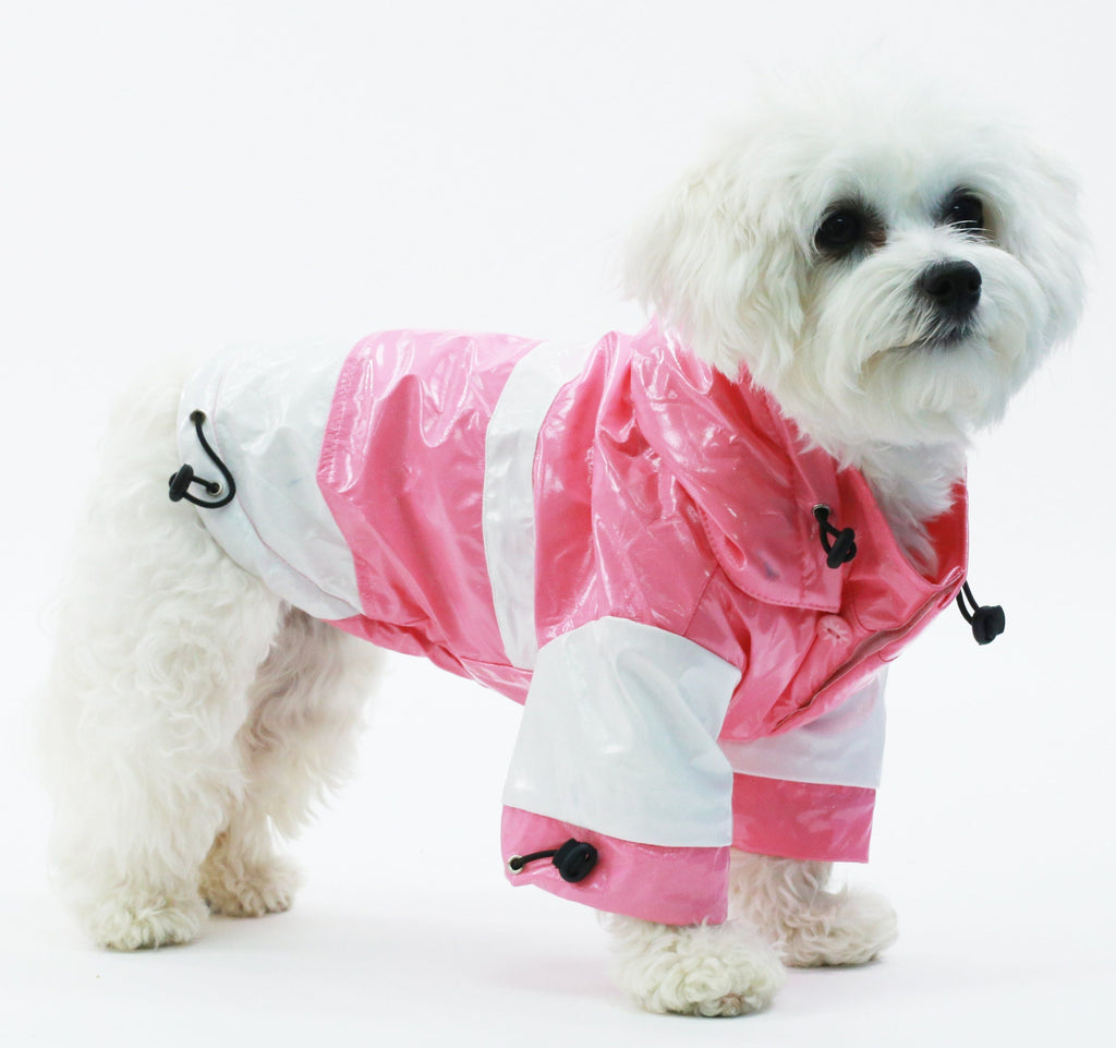 Pink & white waterproof dog raincoat with removable hood and front snap closure