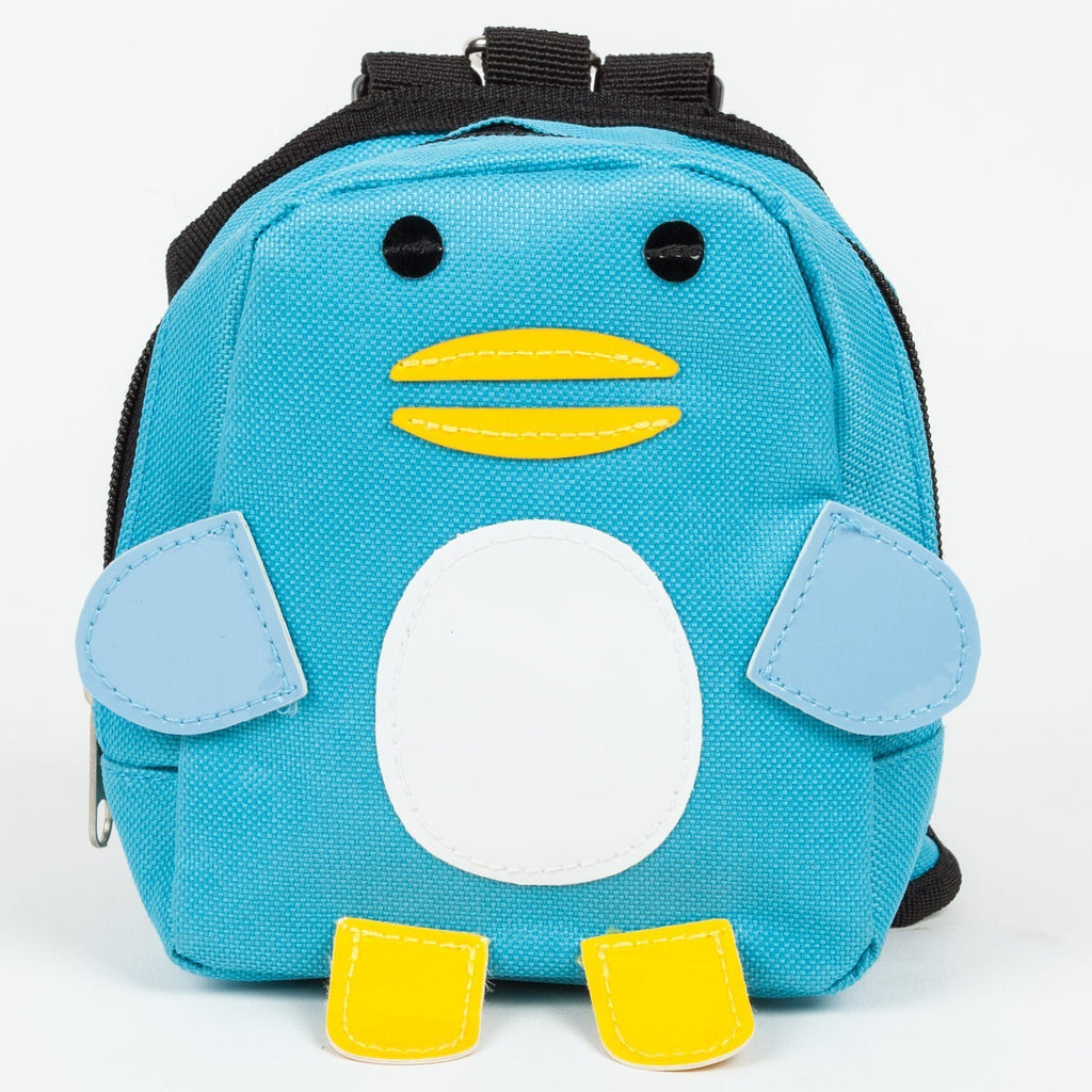 Front close-up of blue animal-face dog harness backpack with white cheeks and yellow feet