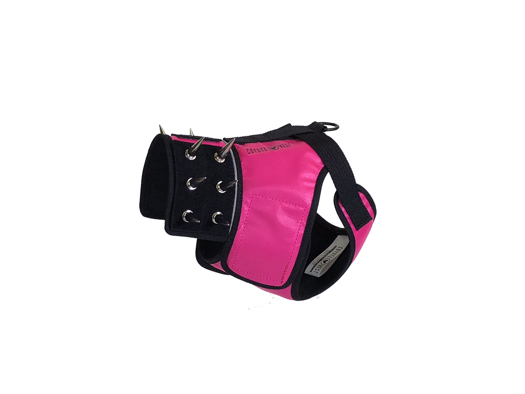 Dog harness with black base and neon pink padded front panel, metal ring snaps