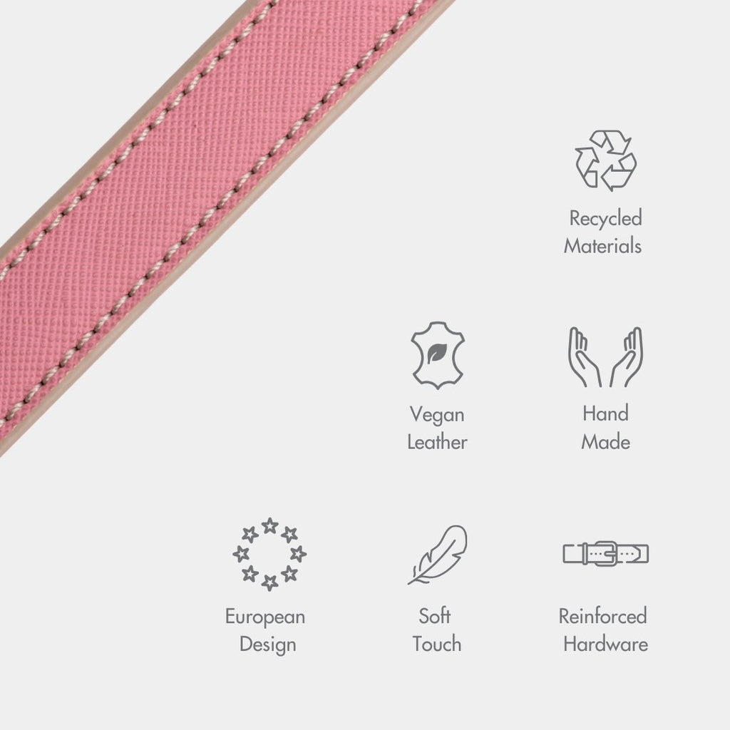 Pink vegan leather leash strap edge with stitched seam and reinforced hardware detail