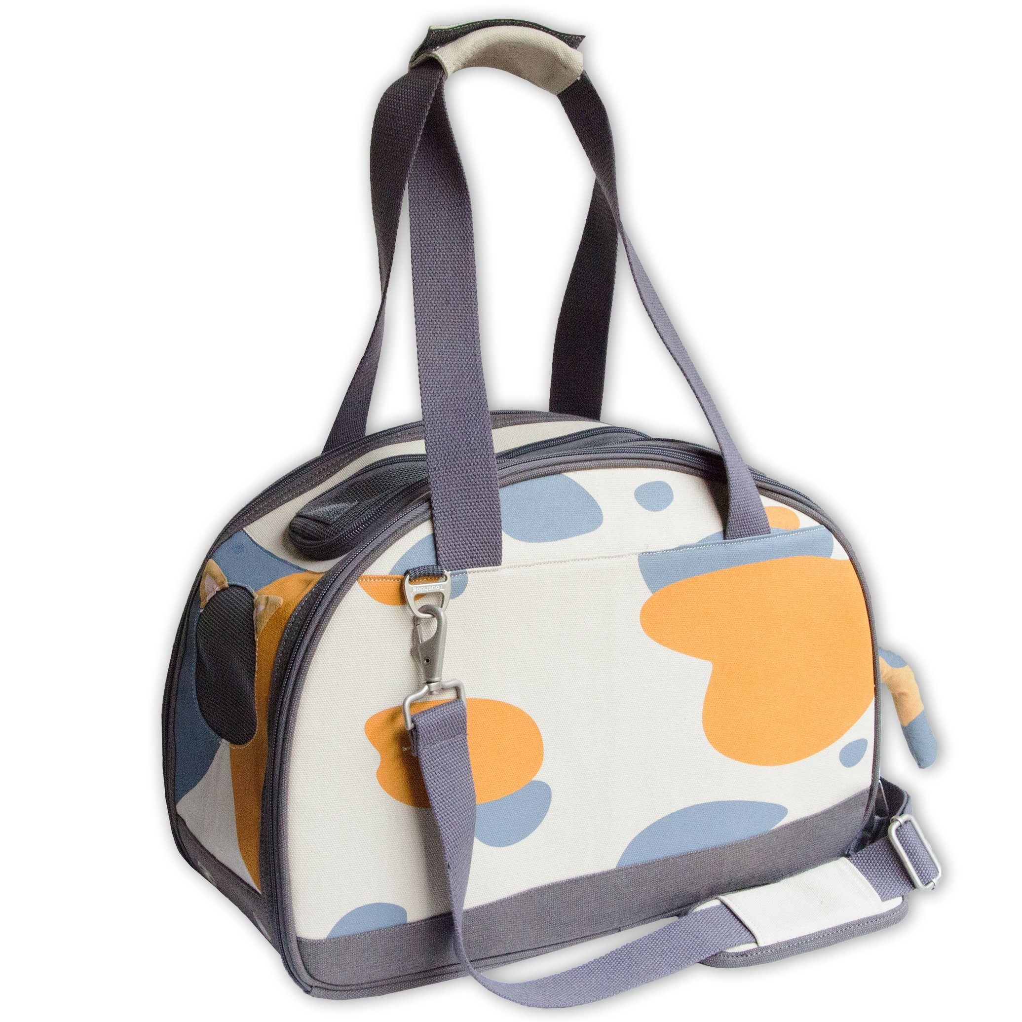 White cat tote carrier with paw-print design, padded handle, zip front and side strap