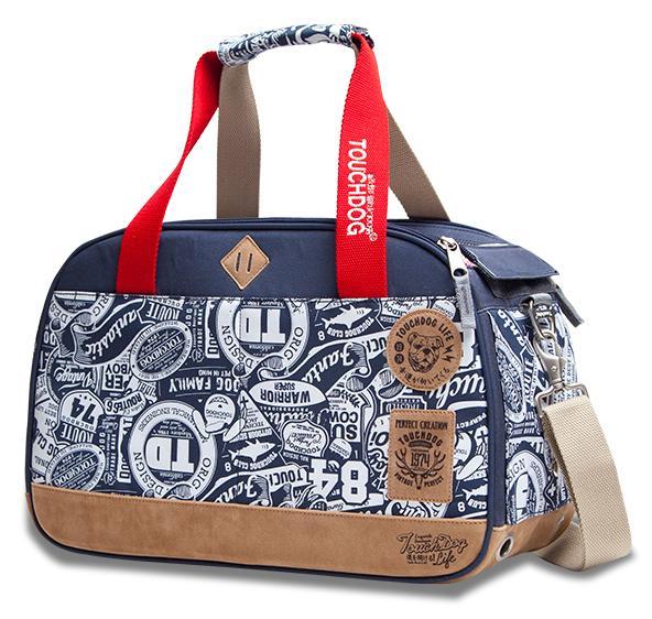 Navy pet carrier duffel with red strap, front zipper pocket, and printed graphic pattern