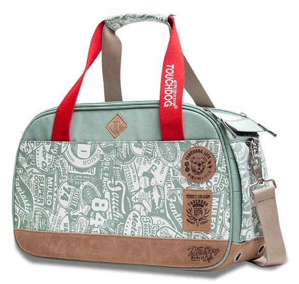 Mint green pet carrier duffel with red handles, front zipper, and printed logos