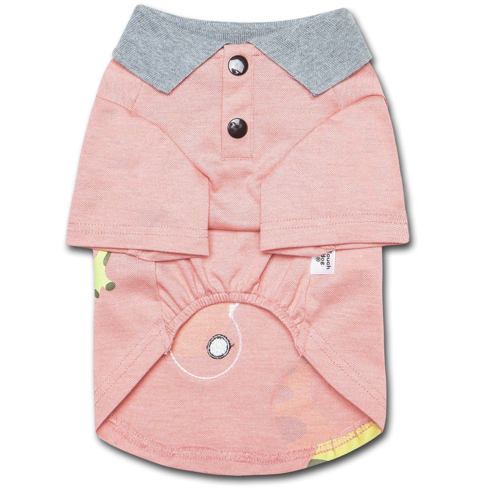 Peach dog polo shirt with gray collar, button placket, and toucan face print