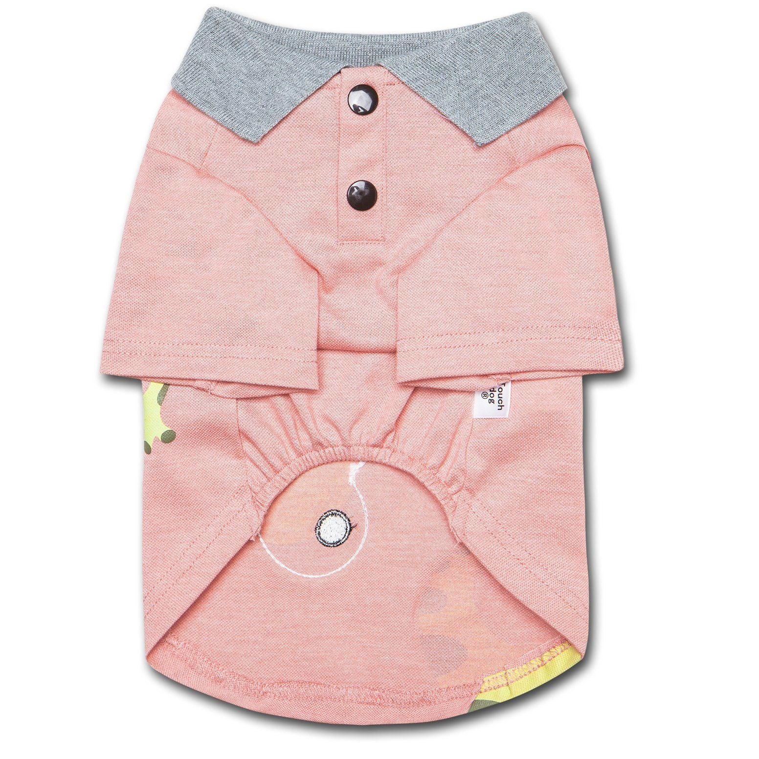 Peach dog polo shirt with gray collar, button placket, and toucan face print