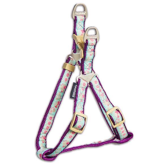 Blue patterned dog harness with adjustable straps and buckles, purple edge stitching