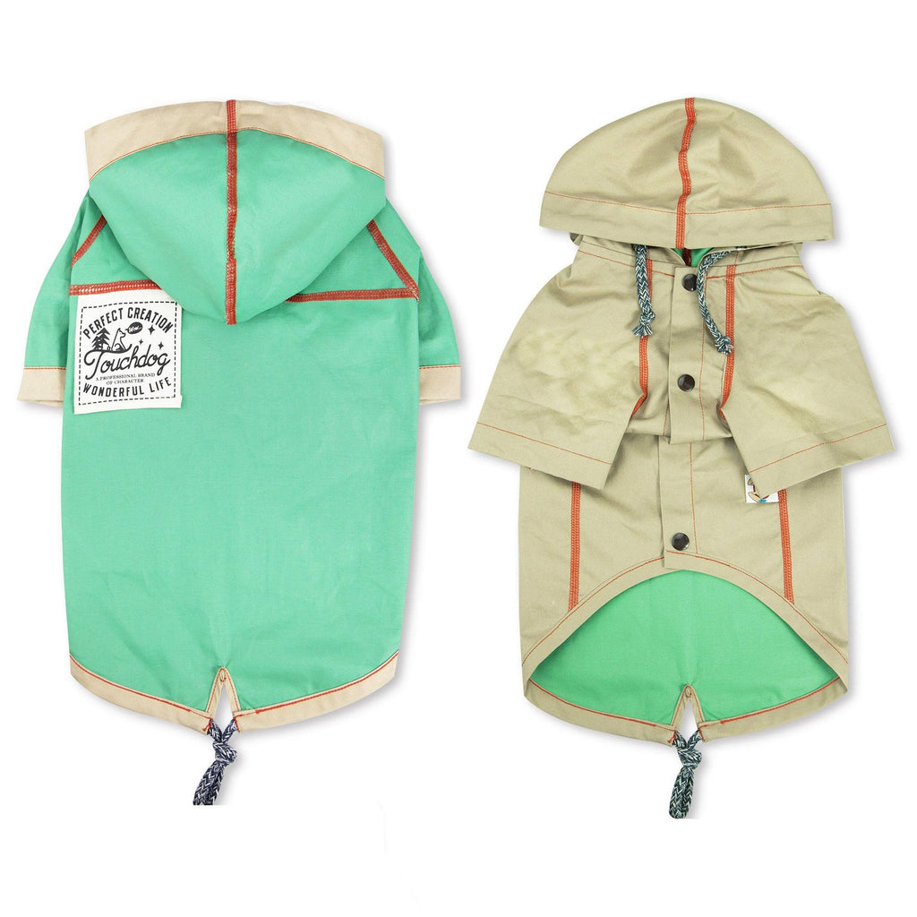 Reversible hooded dog raincoat: green side and beige/tan side with orange trim and snaps