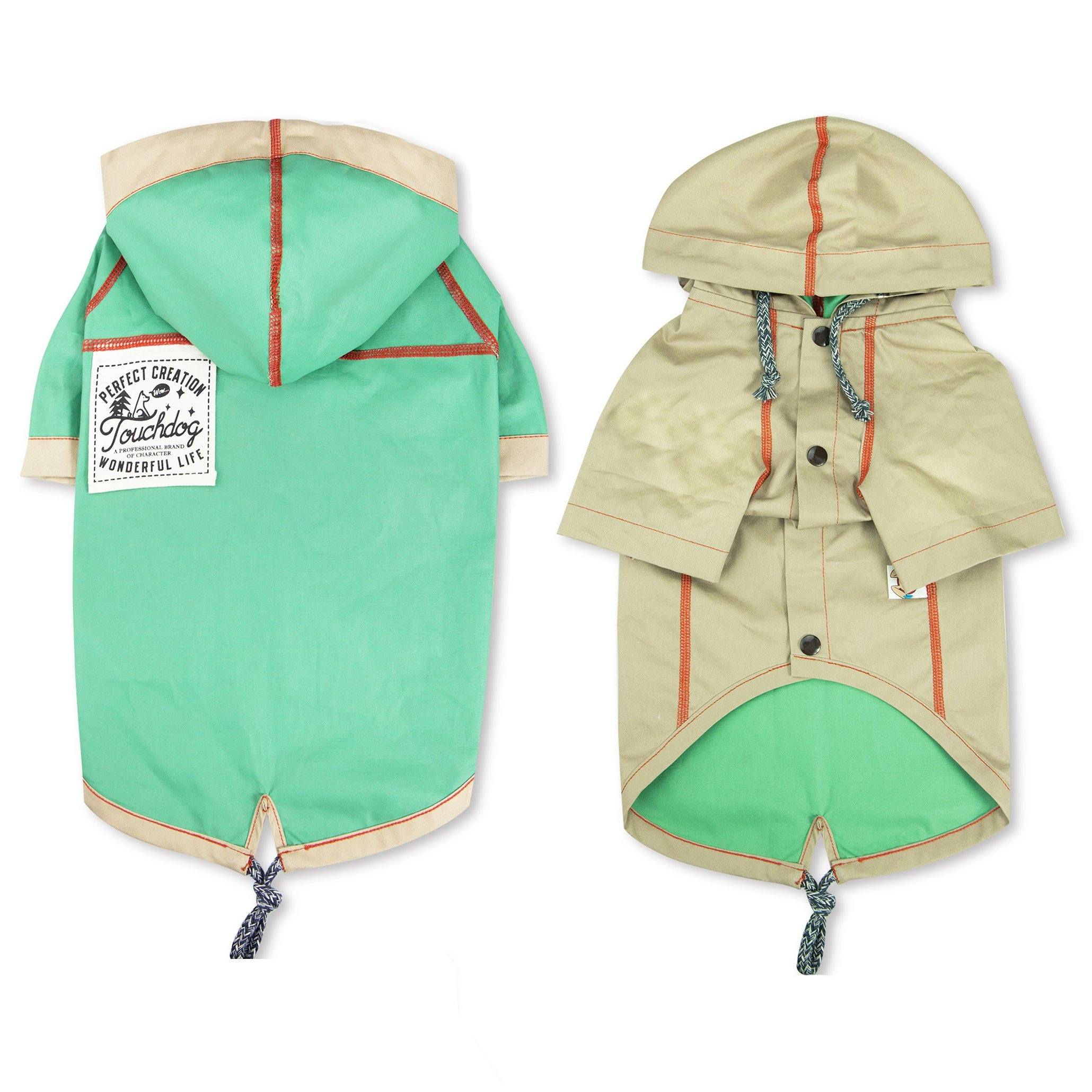 Reversible hooded dog raincoat: green side and beige/tan side with orange trim and snaps