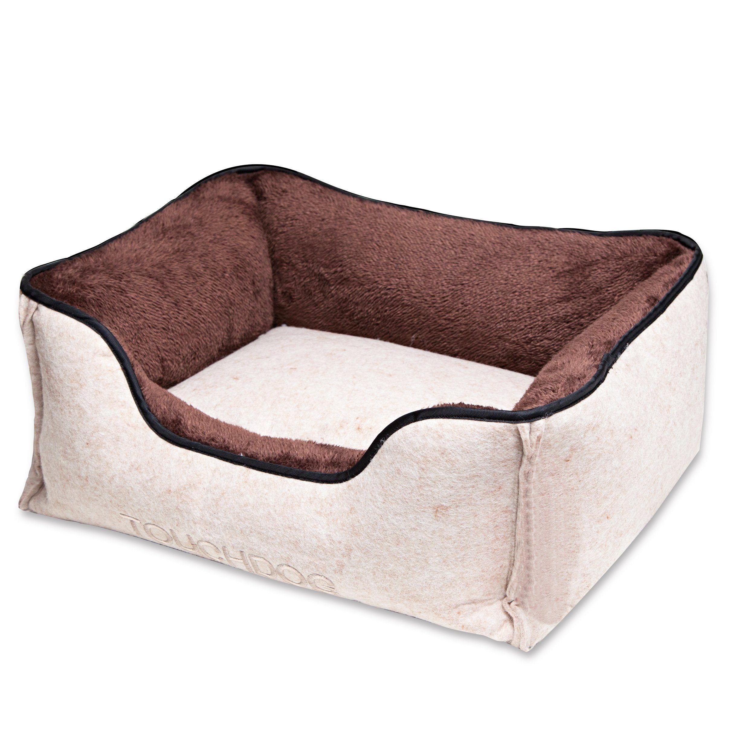 Luxury dog bed with beige exterior and dark brown plush bolsters