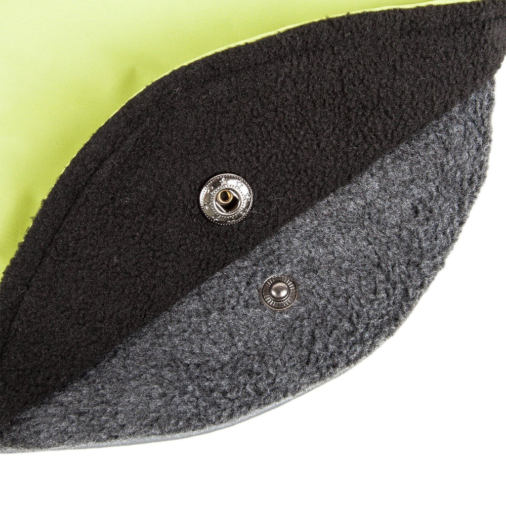 Gray felt liner panel with metal snap buttons on removable dog jacket