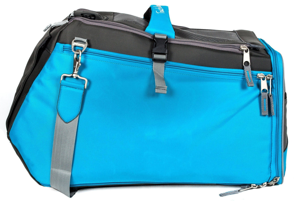 Water-resistant pet carrier in electric blue with zip pockets and adjustable shoulder strap