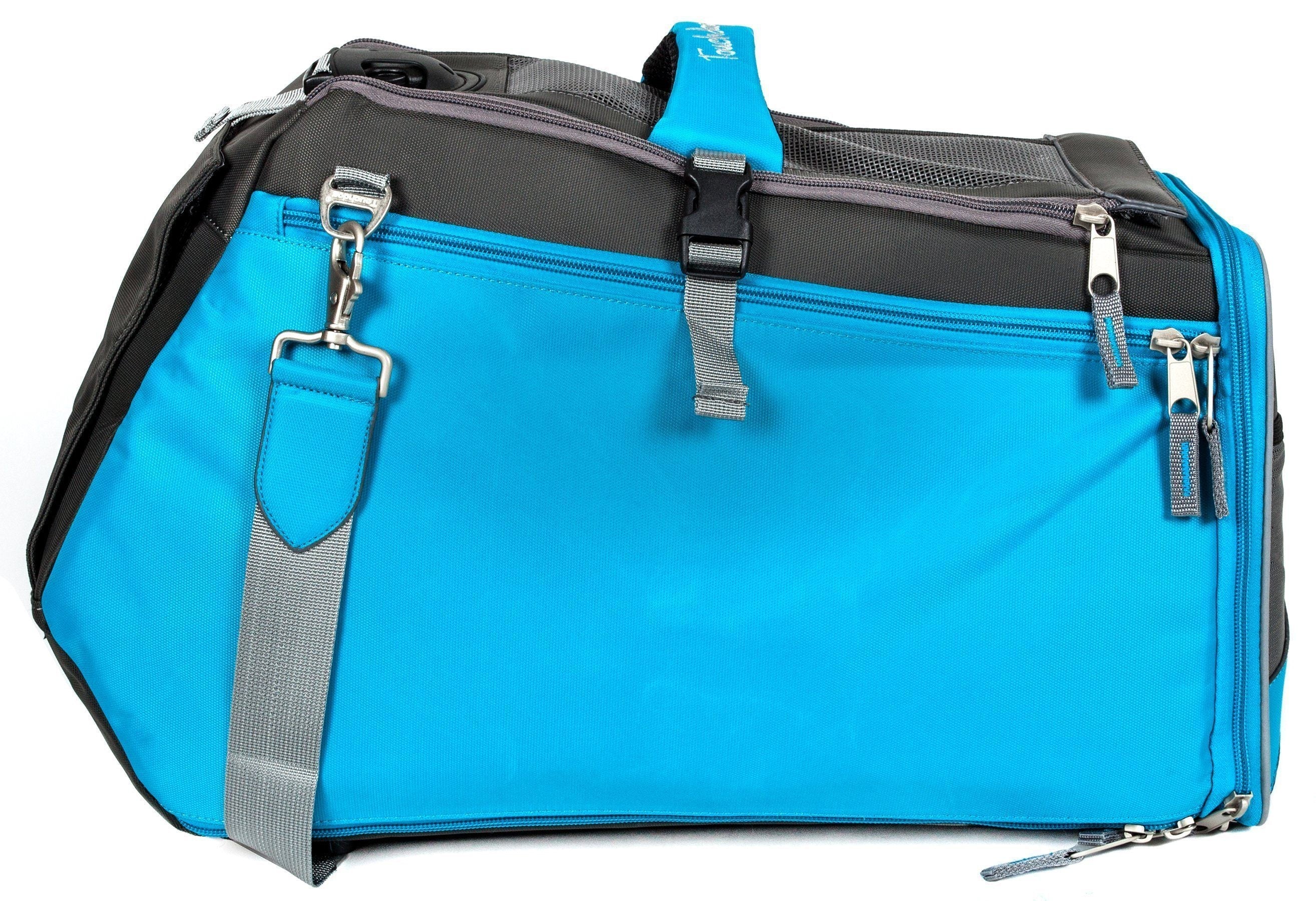 Water-resistant pet carrier in electric blue with zip pockets and adjustable shoulder strap