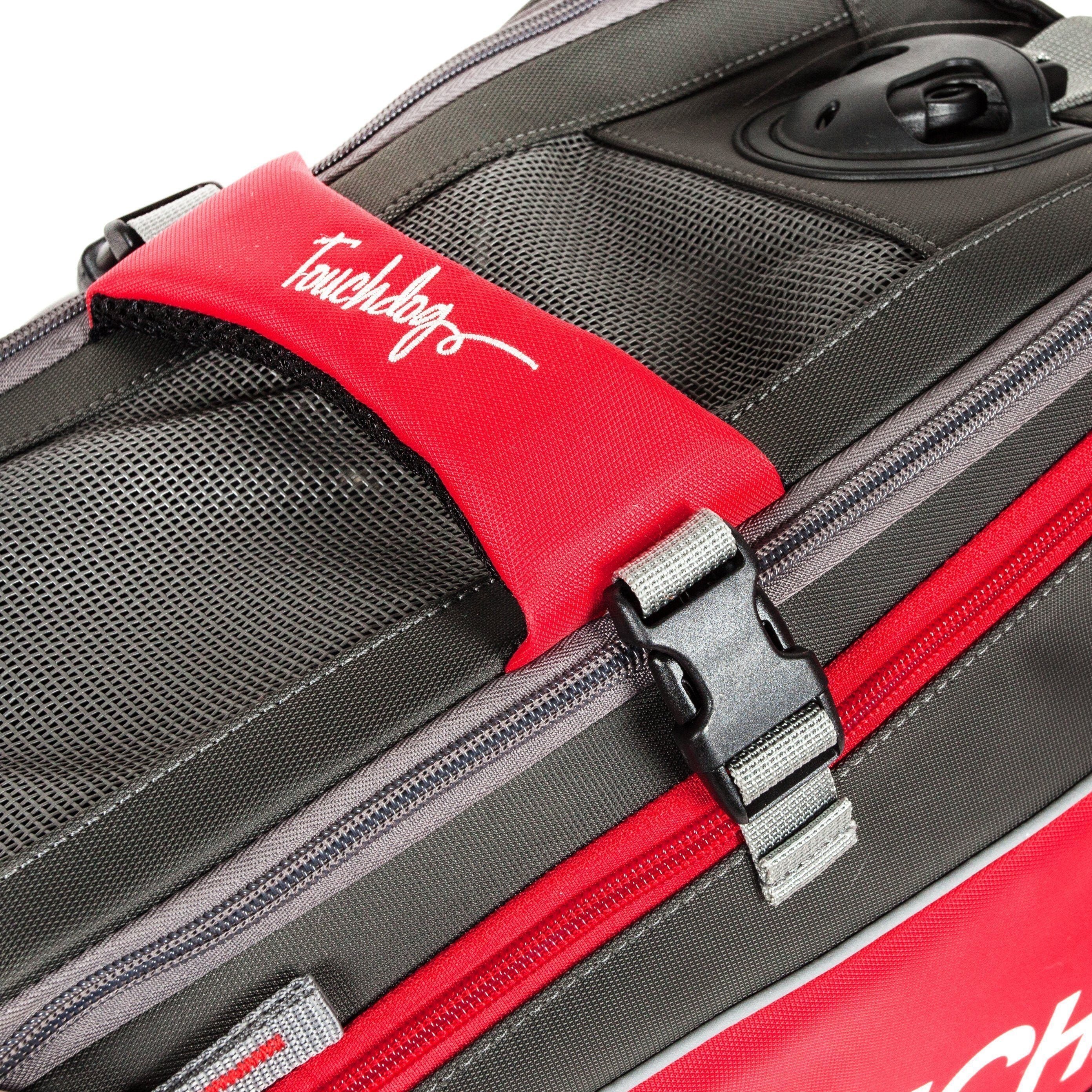 Red pet carrier seat pad with Touchdog-style logo and gray strap hardware