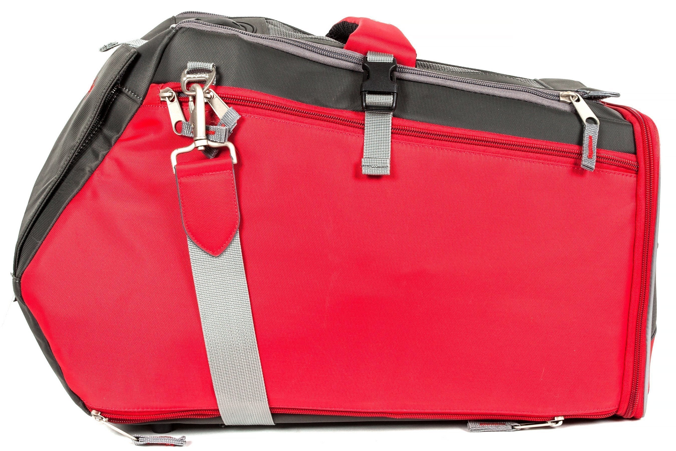 Airline-style pet carrier with red exterior, mesh top, dual zippers and shoulder strap