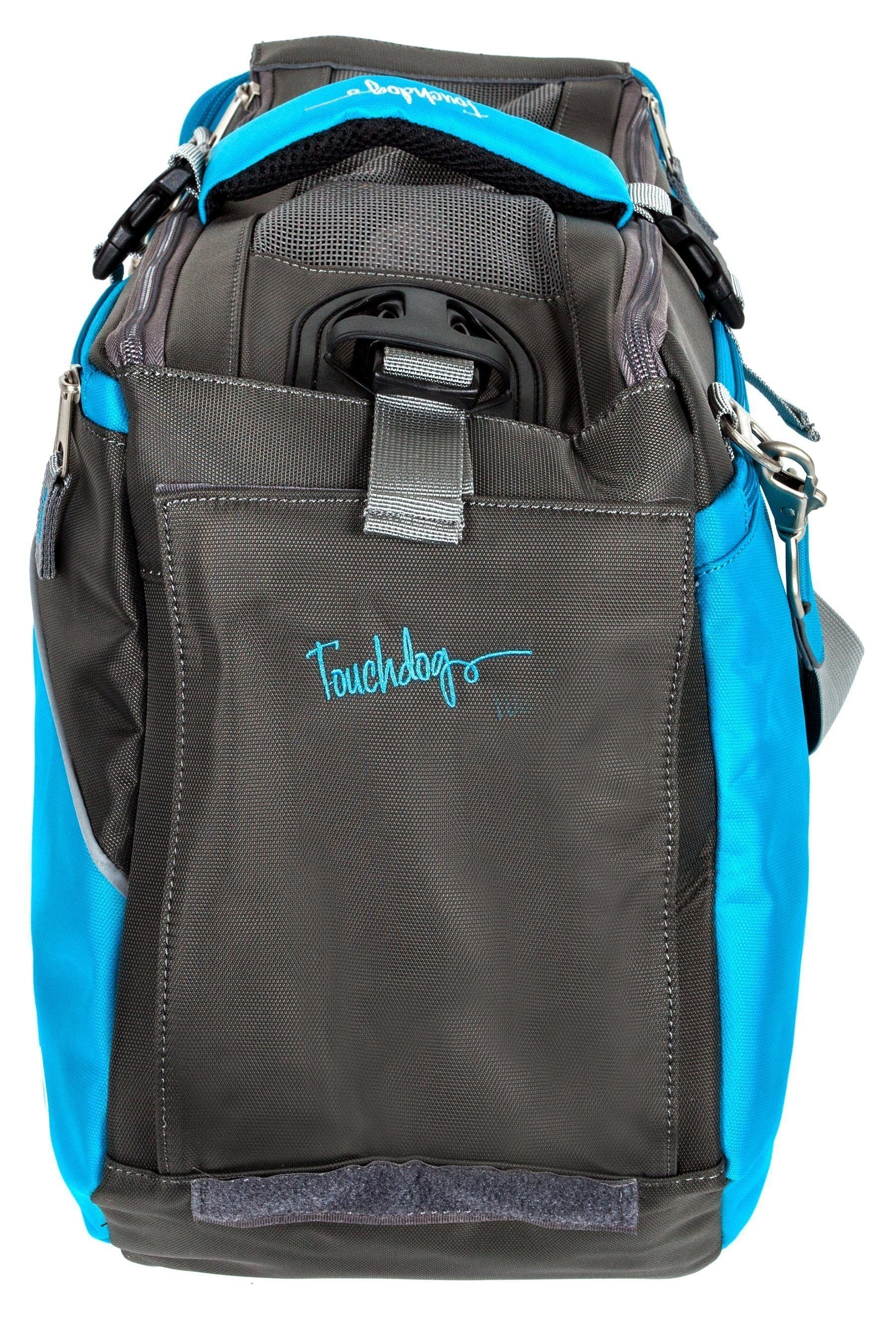 Blue and dark gray pet carrier with mesh window, padded interior, and front latch.
