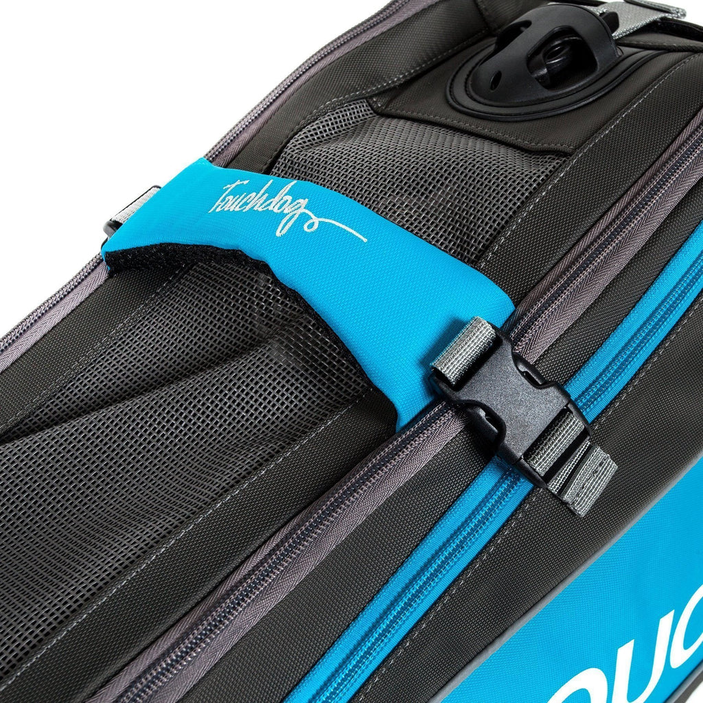 Blue pet carrier seat pad with Touchdog-style logo and gray strap hardware