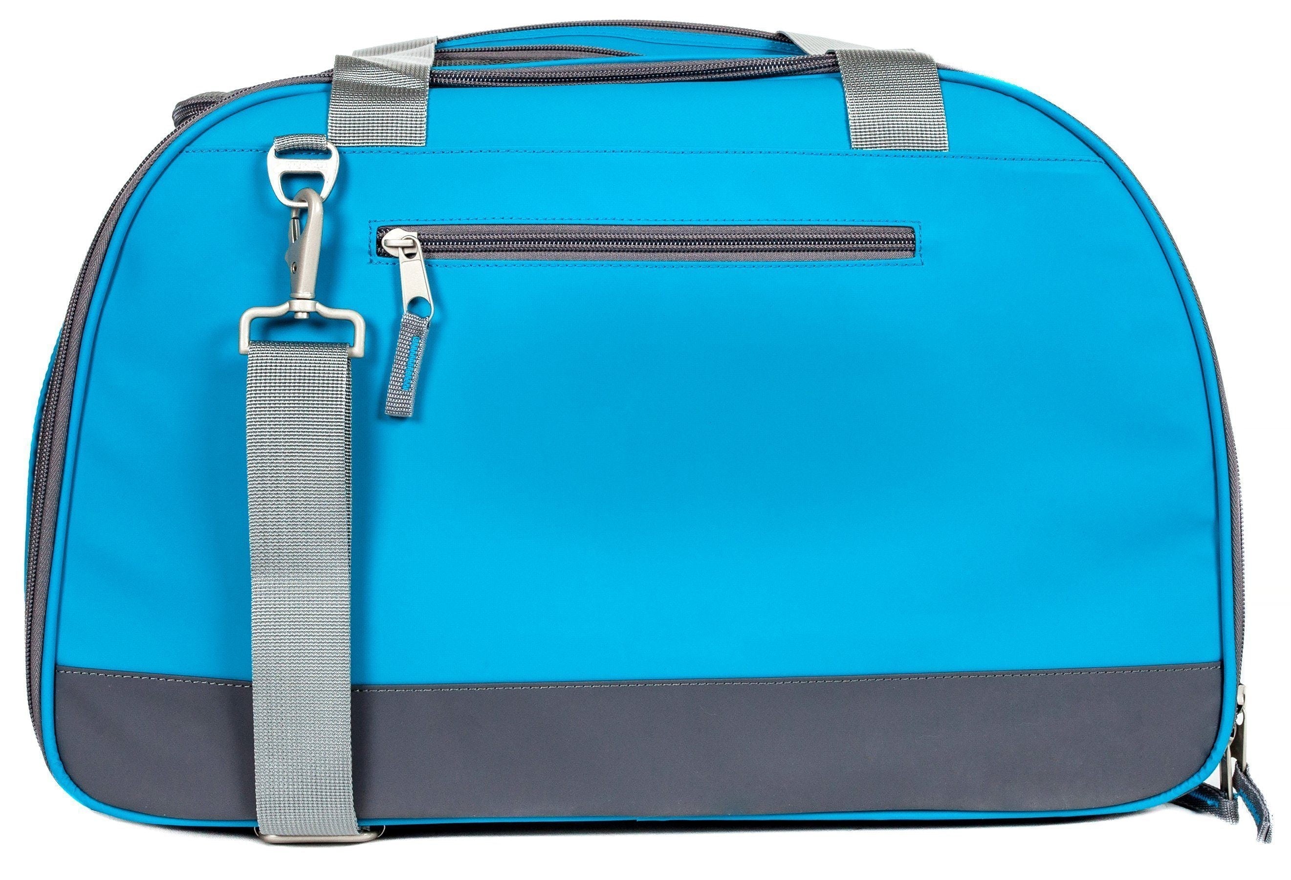 Blue airline-approved dog carrier back view with gray straps and top zipper pocket