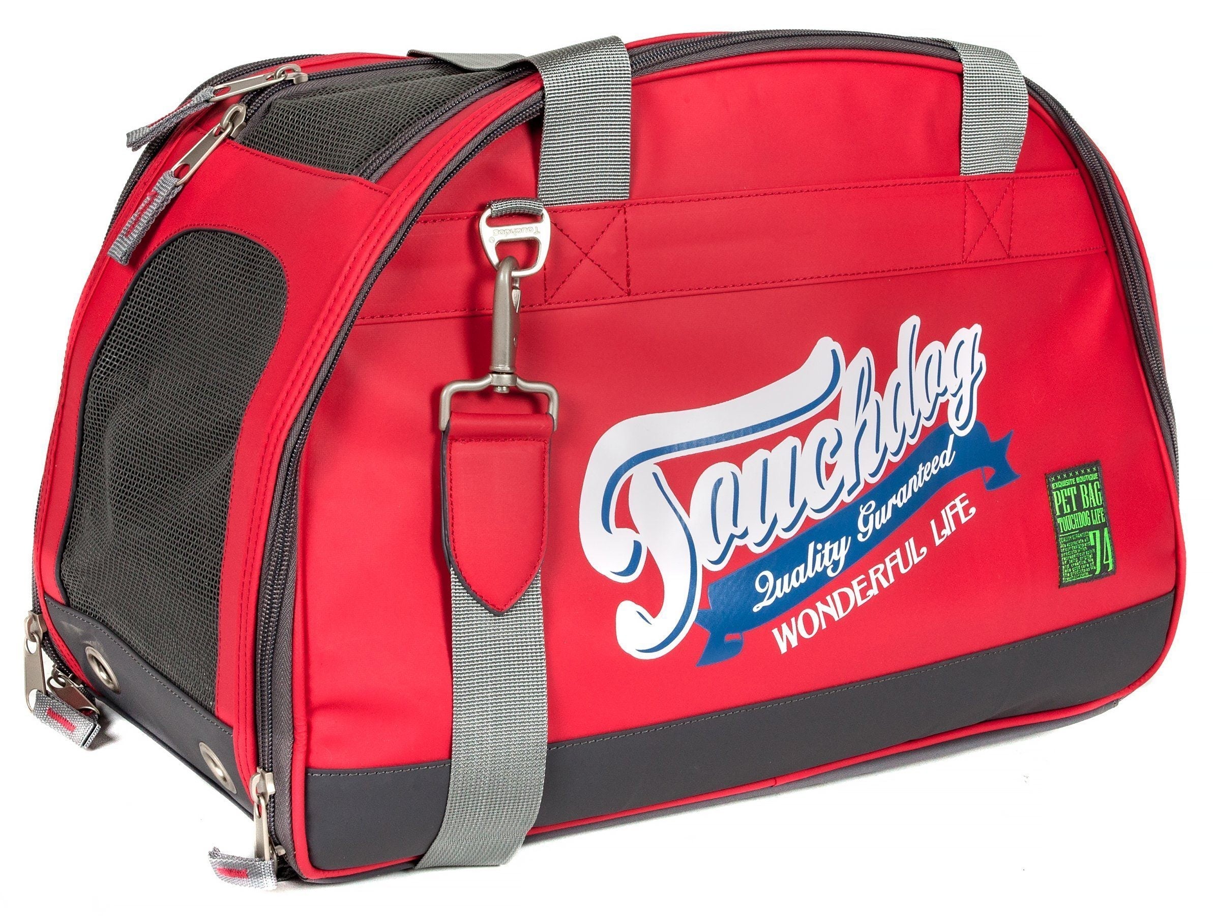 Red airline travel dog carrier with front logo, gray shoulder strap, mesh side panel