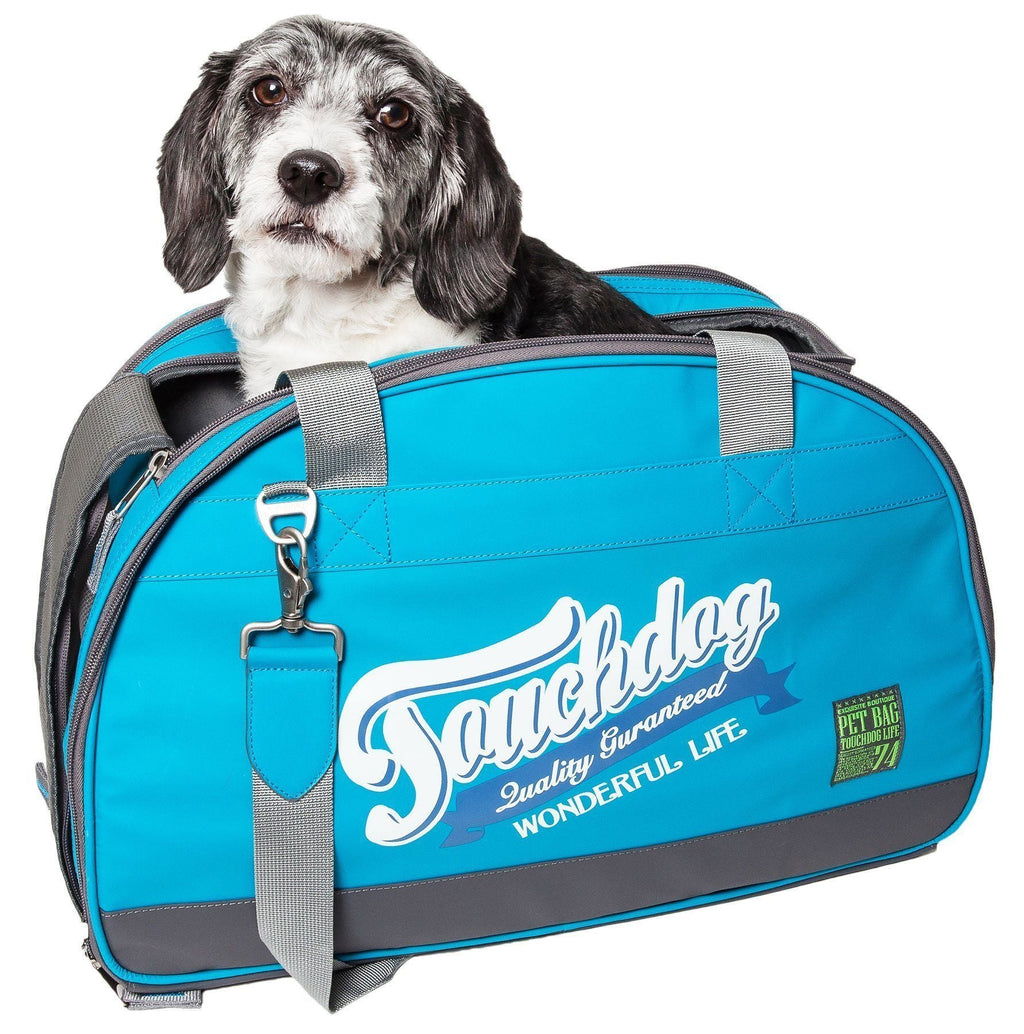 Blue airline-approved dog carrier with front opening and gray crossbody straps